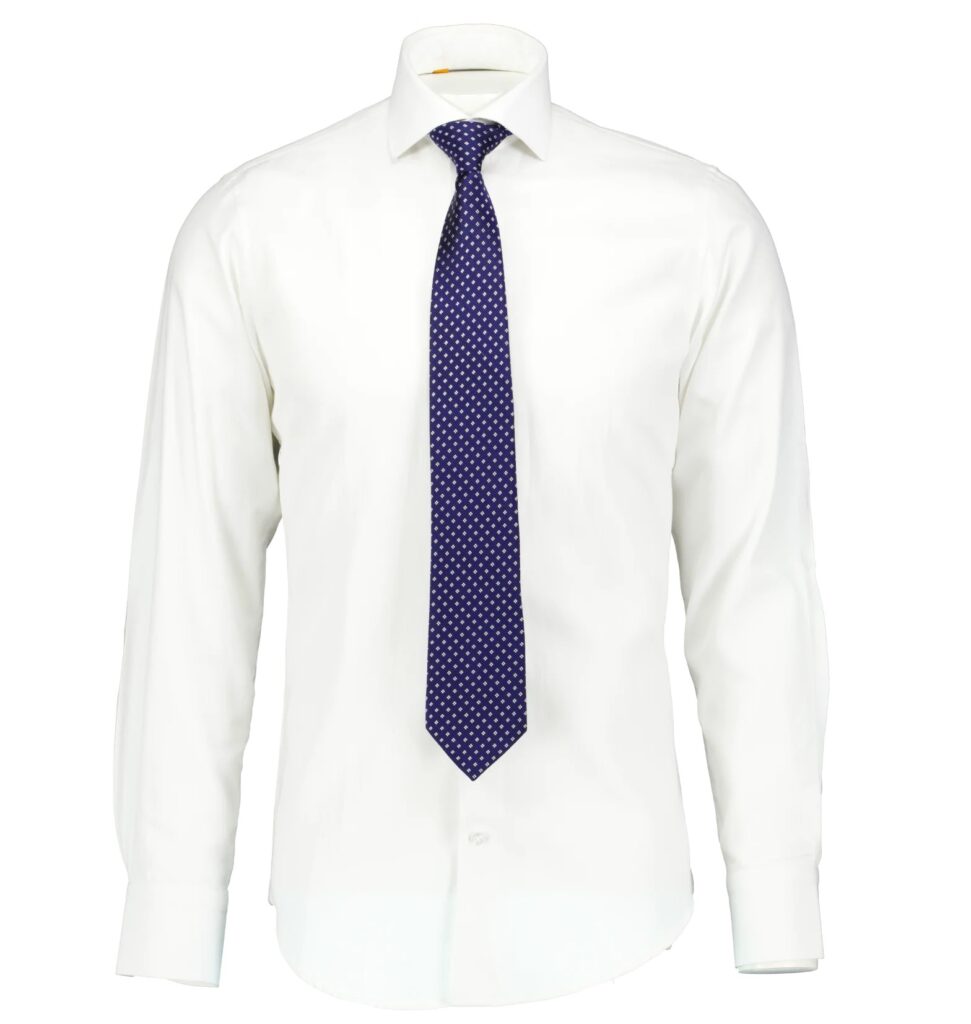 White shirt by Fredericks & Henderson with a tie by Fredericks & Henderson