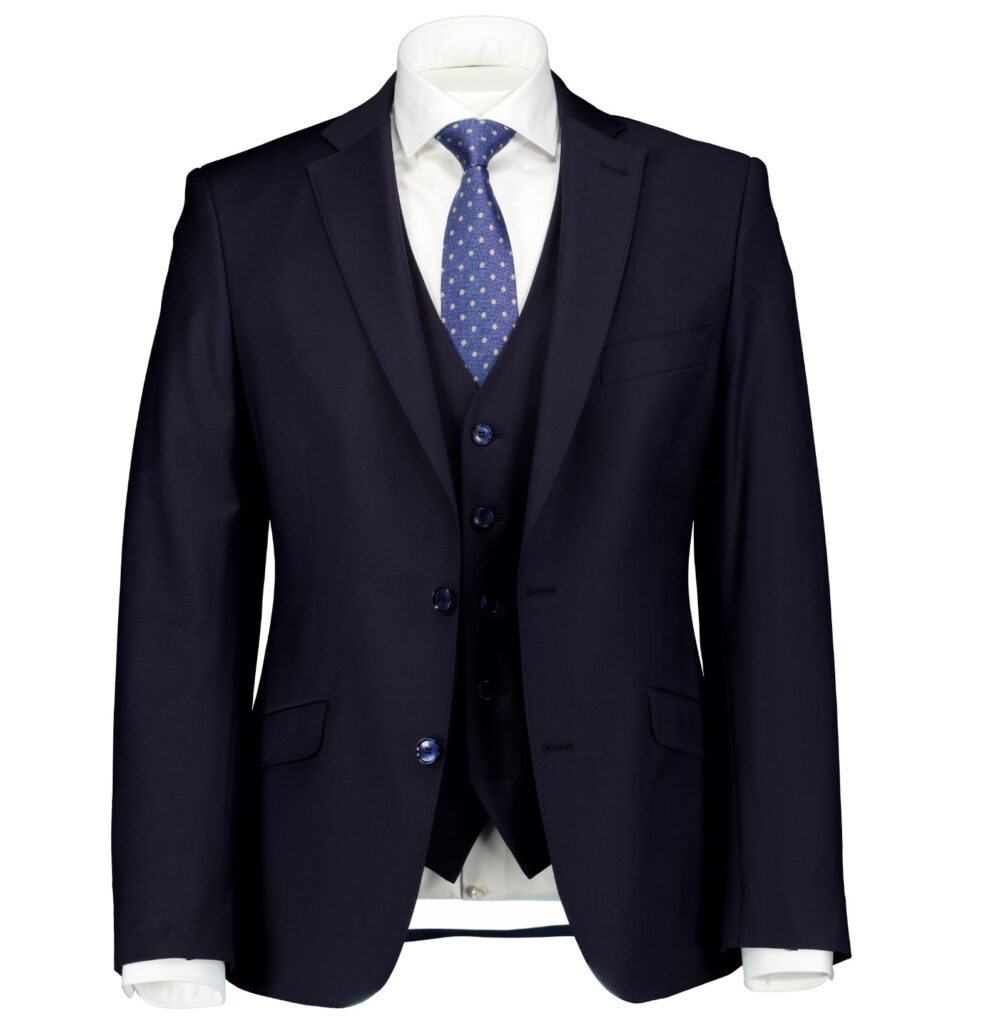 3 piece suit in navy with a white collared shirt accompanied by a blue tie by Fredericks & Henderson